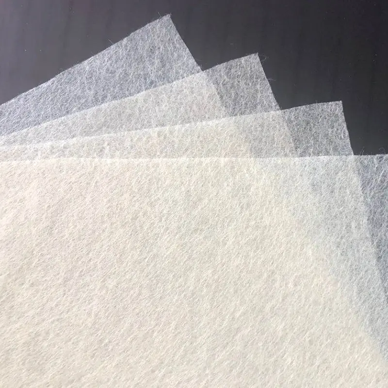 Aramid surface veil